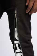 "WITHDRAWN" STACK DENIM (BLACK)