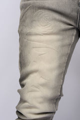 "LOVE IS PAIN" EMBOSSED SKINNY DENIM (CHARCOAL GREY/SAND)