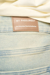 "LOVE IS PAIN" EMBOSSED SKINNY DENIM (LIGHT BLUE/SAND)